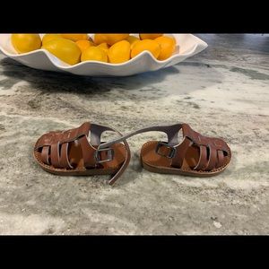 Freshly picked brown leather sandals